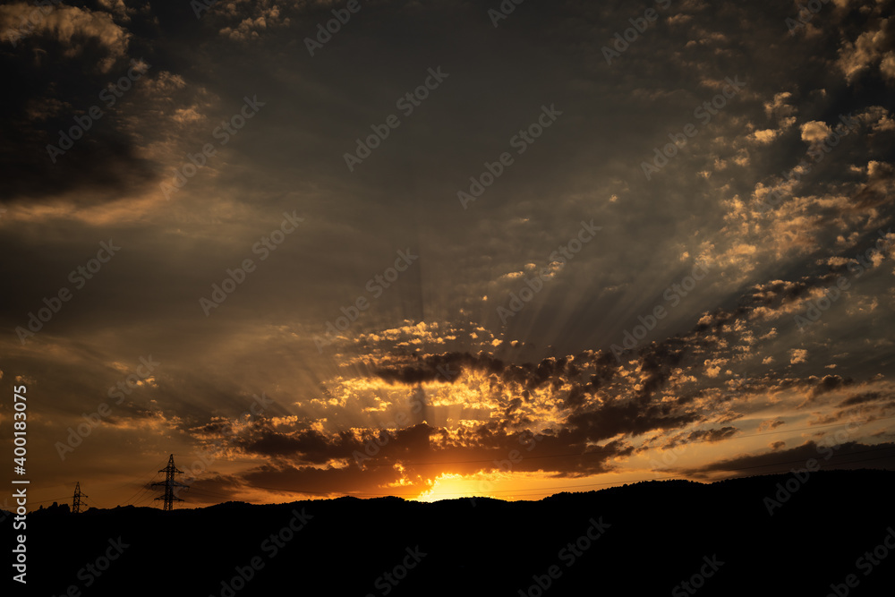 Sunset on a cloudy day with sun rays Sunset on a cloudy day with sun rays