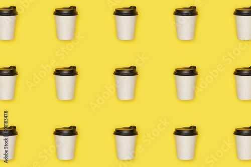 Wallpaper Mural Flat lay paper white cup with back plastic cover pattern on yellow illuminating background. High quality photo Torontodigital.ca