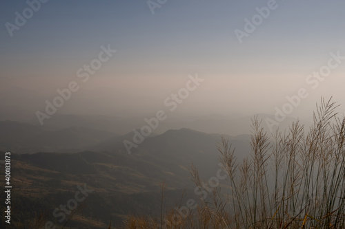 View of hill with mist and blue sky background, Phu Langka national Park, Phayao, Thailand.