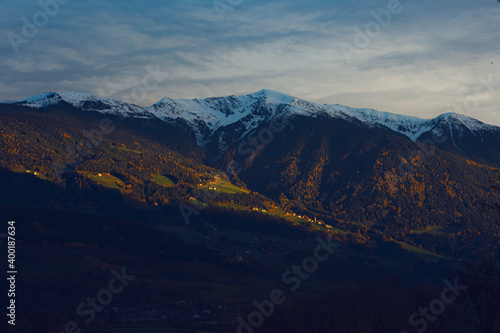 dolomites mountains with snow and sunset sky © Emanuele