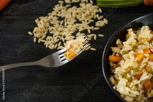 Fresh Orzo Salad With carrots, leeks, red and green pepper.