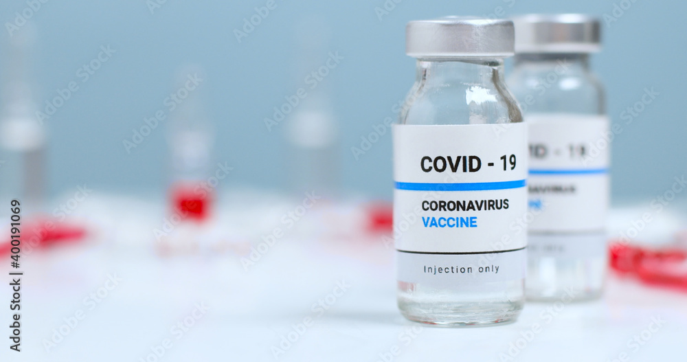 Coronavirus Sars-Cov-2 vaccine vials with copy space in the laboratory. Covid-19, 2019-nCov pandemic. Coronavirus Sars-Cov-2 vaccine vials with copy space in the laboratory. Covid-19, 2019-nCov pandemic.