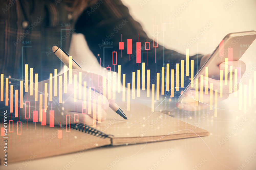 Double exposure of forex graph sketch hologram and woman holding and using a mobile device. Stock market concept. Double exposure of forex graph sketch hologram and woman holding and using a mobile device. Stock market concept.