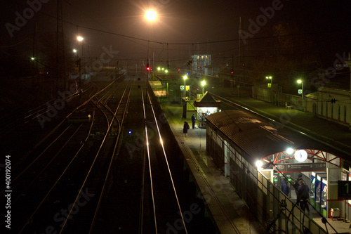 The platform of railway station at night