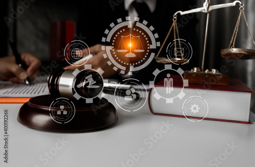 justice and law concept.Male judge in a courtroom on table office, Male lawyer working  law interface icons.