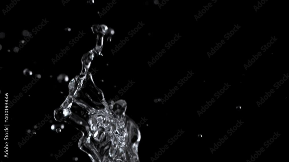 Super Slow Motion Shot of Water Splash at 1000fps on Black Background. Super Slow Motion Shot of Water Splash at 1000fps on Black Background.