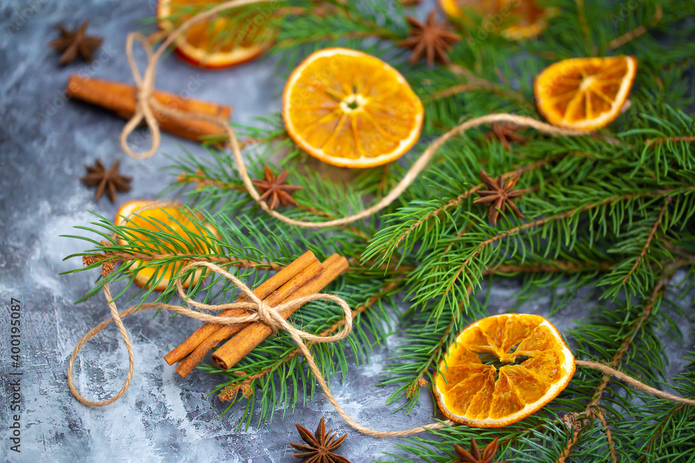 Festive background for the new year 2021. Christmas tree on the table with dried fruits and spices, background for New Year's recipes. Elegant card decor for Christmas greetings. Festive background for the new year 2021. Christmas tree on the table with dried fruits and spices, background for New Year's recipes. Elegant card decor for Christmas greetings.