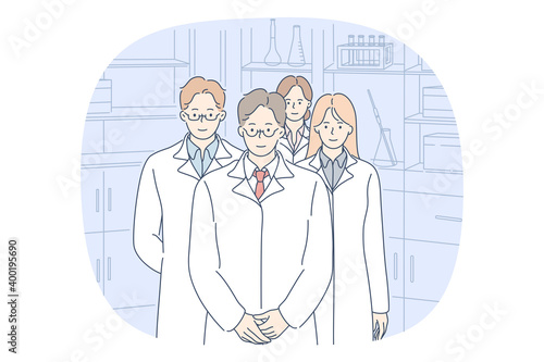 Doctor, medicine, healthcare concept. Group of young smiling people doctors in white uniform cartoon character standing together in team in medical clinic. Medicare, therapist, pharmacist