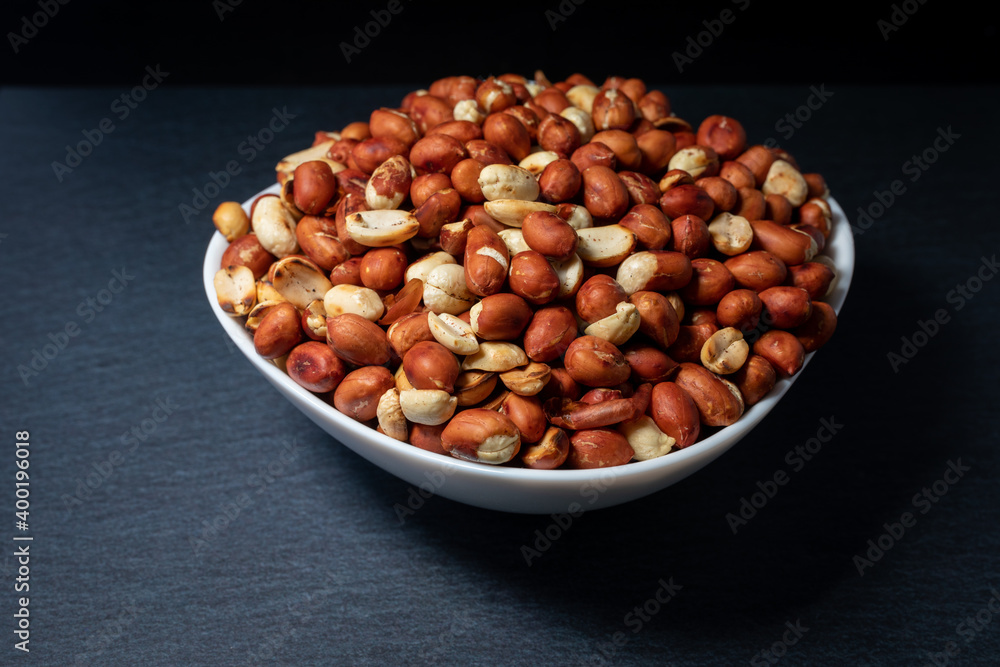 Heaps of peanuts on a plate Heaps of peanuts on a plate