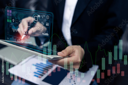 Business hands working in office with analyzing sales data and economic growth graph financial, Digital laptop and table with global network connection interface icons. 