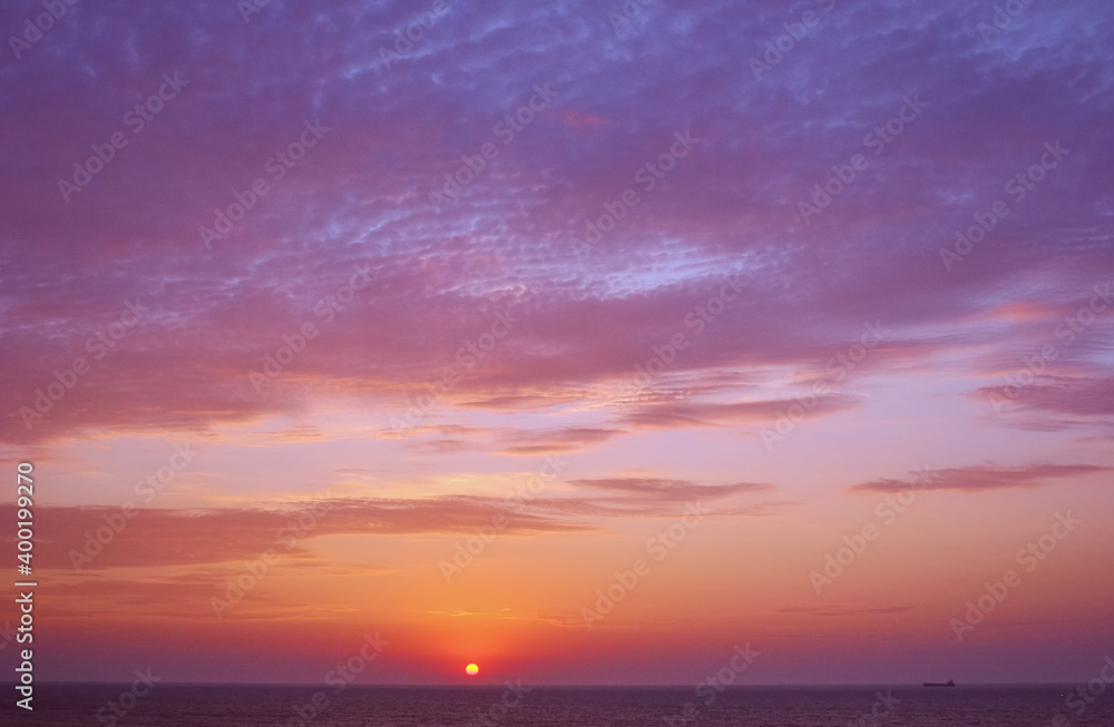 Beautiful sunset on the beach and sea