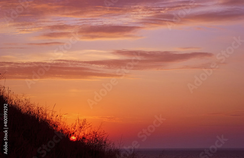 Beautiful sunset on the beach and sea