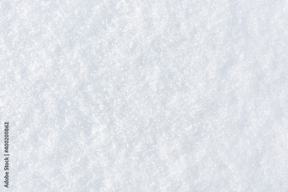 Fresh clean snow background. Frosty winter texture with snowflakes for design.