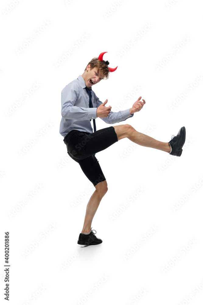 Dance. Happy young man dancing in casual clothes or suit, remaking legendary moves and dances of celebrity from culture history. Isolated on white. Action, motion, fame concept. Creative occupation. Dance. Happy young man dancing in casual clothes or suit, remaking legendary moves and dances of celebrity from culture history. Isolated on white. Action, motion, fame concept. Creative occupation.