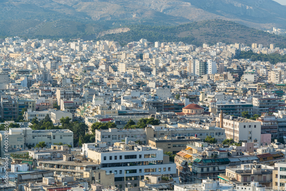 Aerial view of cityscape with crowded buildings of Athens in a sunny day in Greece Aerial view of cityscape with crowded buildings of Athens in a sunny day in Greece