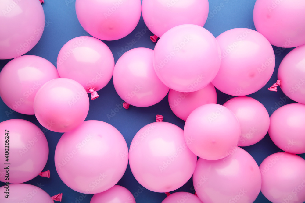 Many pink balloons on dark blue background. Many pink balloons on dark blue background.