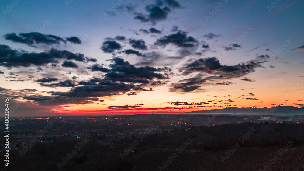 Colorful sunset in the italian vineyards Colorful sunset in the italian vineyards