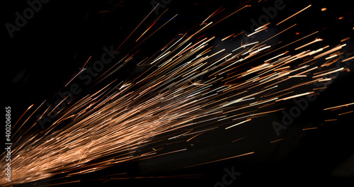 Stream of sparks on a black background