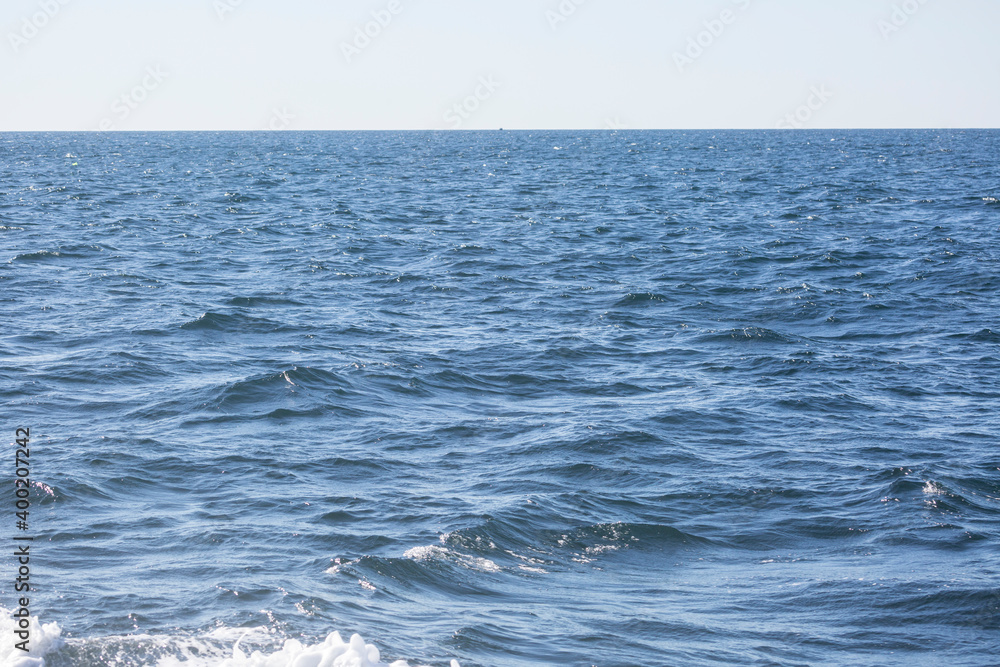 Fototapeta premium Ripples on surface of beautiful ocean water background