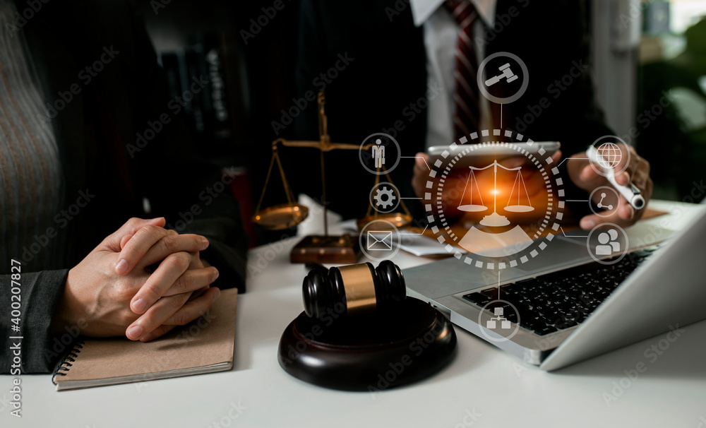 Concepts of Law and Legal services. Lawyer hand using law interface icons. 
