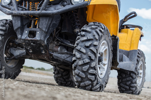 ATV on a dirt field in summer close-up