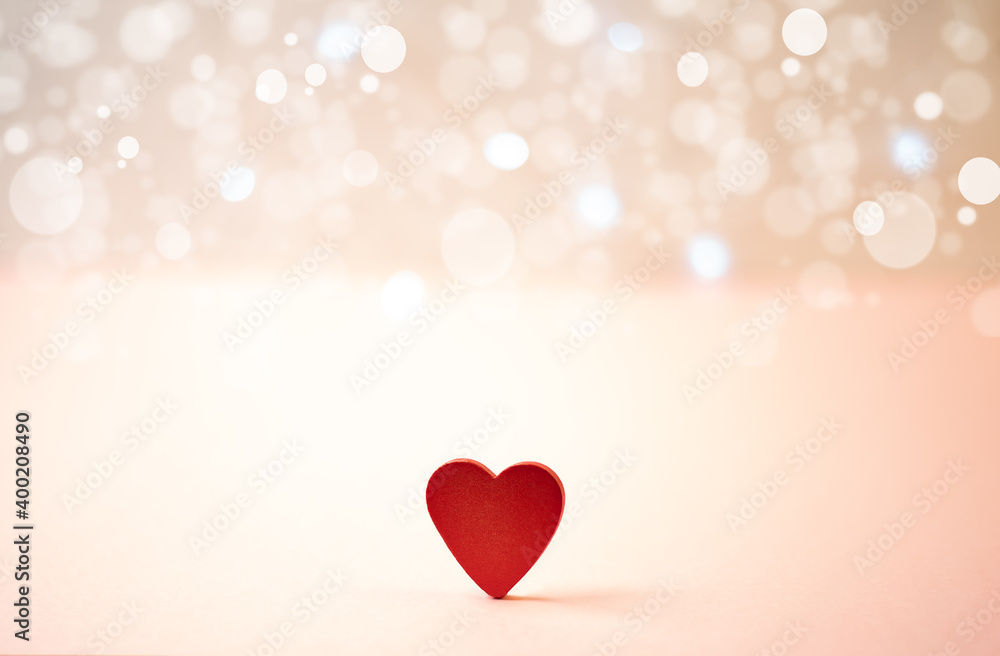 Red heart on bokeh background. The concept of Valentine's day