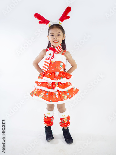 Merry Christmas girl Wearing Santa claus suit on white background