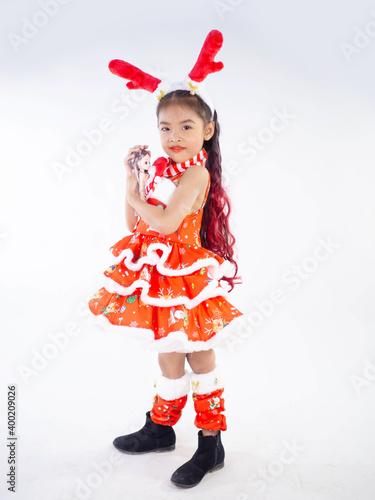 Merry Christmas girl Wearing Santa claus suit on white background