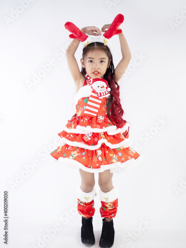 Merry Christmas girl Wearing Santa claus suit on white background