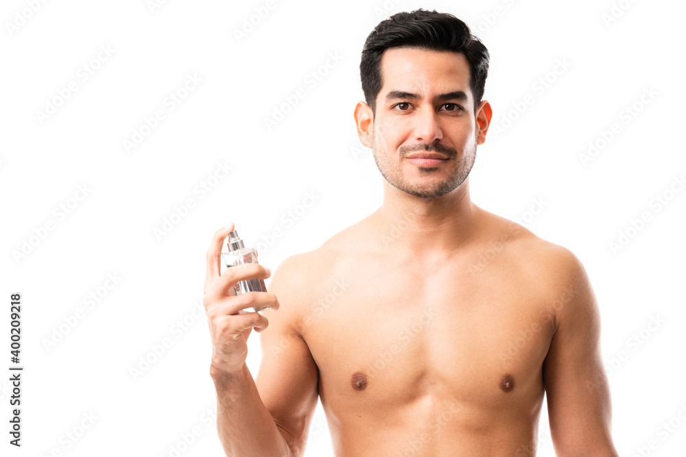 Fototapeta premium Good looking man wearing cologne