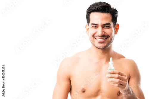 Male model with hyaluronic acid moisturizing serum