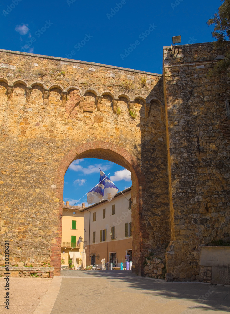Naklejka premium Porta Nuova, one of the gates to the historic medieval village of San Quirico D'Orcia, Siena Province, Tuscany, Italy