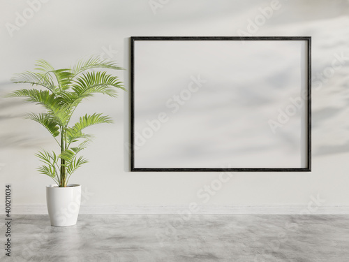 Fototapeta Naklejka Na Ścianę i Meble -  Black frame hanging in bright interior mockup. Template of a picture framed on a wall 3D rendering