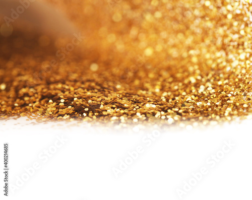 Soft focus blur Abstract light blur blink sparkle backgound. Gold (bronze) glitter shine dots confetti.