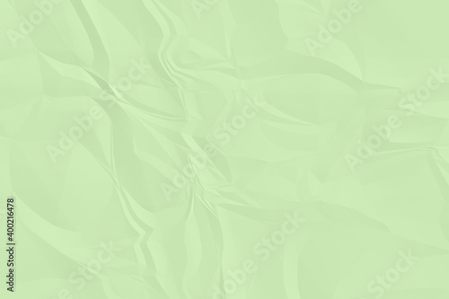 crumpled green paper background close up