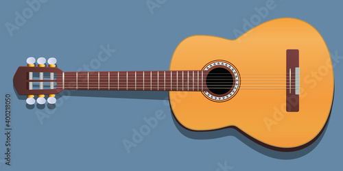 Une guitare acoustique classique, symbolisant la musique folk les années soixantes pour un festival.