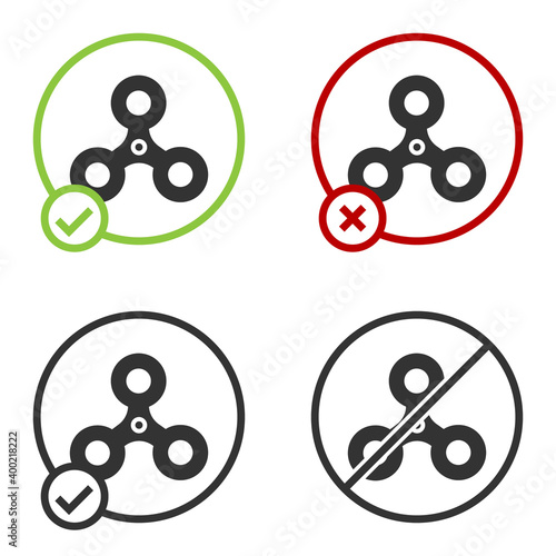 Black Fidget spinner icon isolated on white background. Stress relieving toy. Trendy hand spinner. Circle button. Vector.