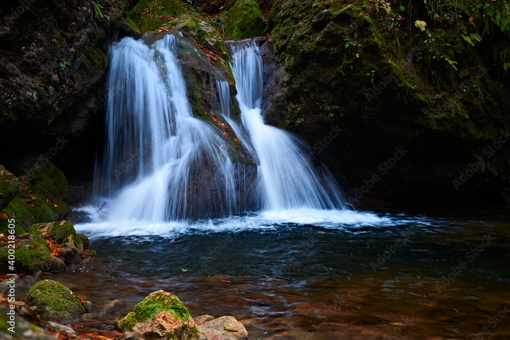 Fototapeta premium Waterfall on a mountain river.