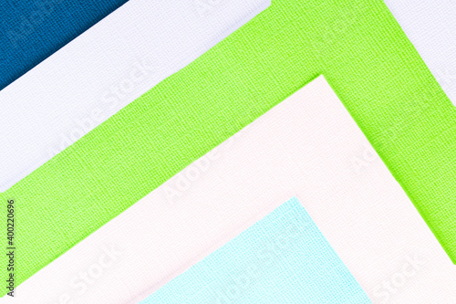 Abstract color papers geometry flat lay composition banner background with green, pink, blue color tones