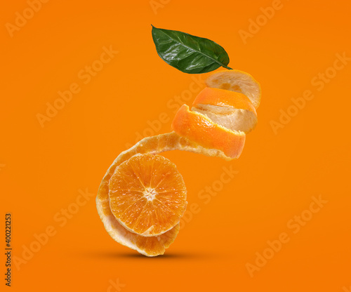 Peeled Palagonia's orange dancing on orange background