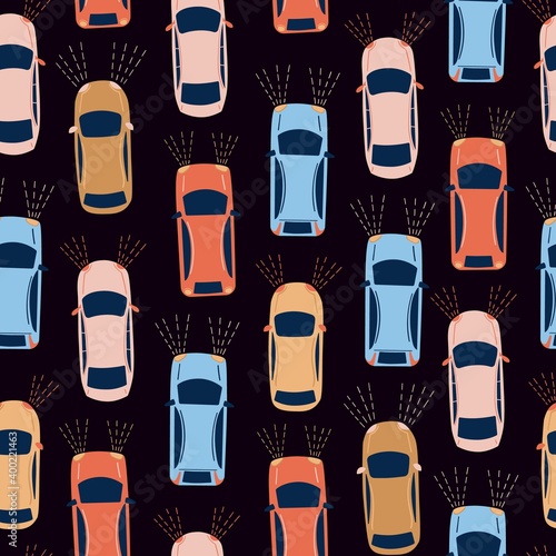 Seamless vector pattern with cars. Cartoon colorful auto on black background