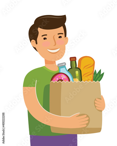 Sale of food. Young man holding paper bag with foodstuffs