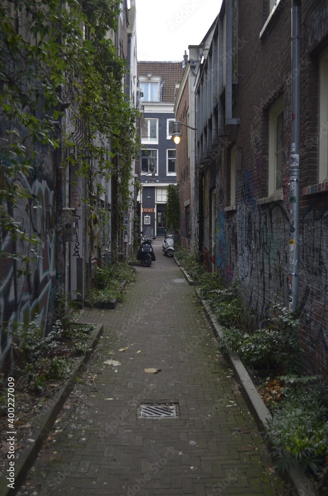 One narrow street of Amsterdam, The Netherlands One narrow street of Amsterdam, The Netherlands