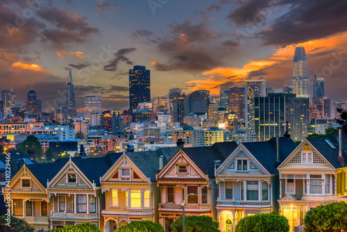Alamo Square and Painted Ladies with San Francisco skyline in the evening hour