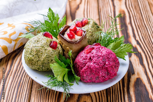 assorted pkhali Georgian cuisine on wooden table photo