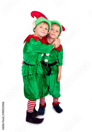 Two little boys dressed in christmas costume