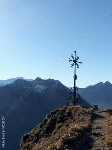 Summit cross of Sonnenberg mountain, Bavaria, Germany