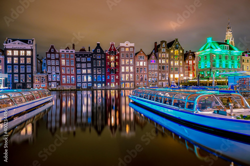 Canvas Print Amsterdam canals in the evening light, Dutch canals in Amsterdam Holland Netherlands during winter time in the Netherlands