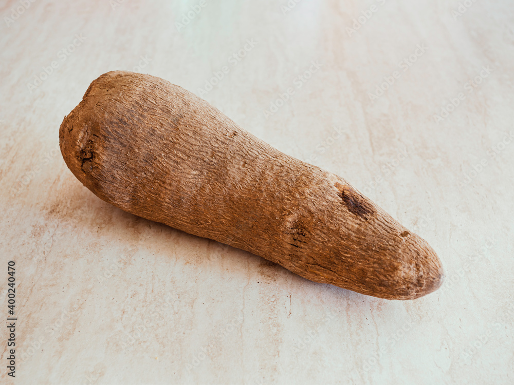 Obraz na plátně Yam, a tuber that boasts health benefits and properties on a marble table