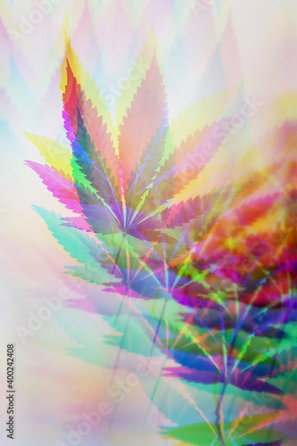 Trippy and psychedelic cannabis leaf. Hallucinations caused by cannabis or marijuana. Weird and wild cannabis background. The use of drugs to alter your mind. 